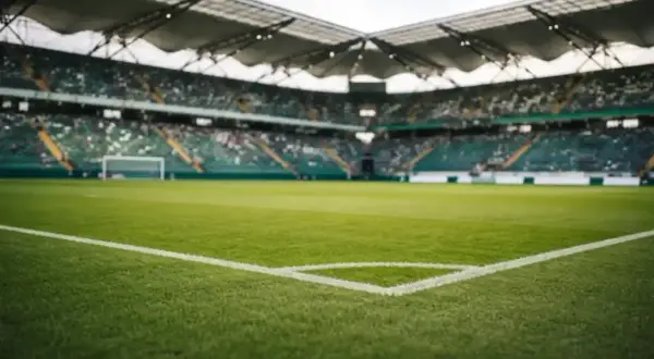 Pusta trybuna stadionu piłkarskiego, gotowa na emocje baraży do mistrzostw świata.